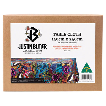 A brown box with a white label and the text 'Justin Butler Table Cloth' and a photo of the table cloth.