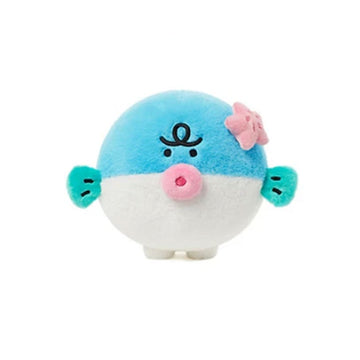 Plush toy with a blue top half, white bottom half, pink cheeks, and green fins on a white background.