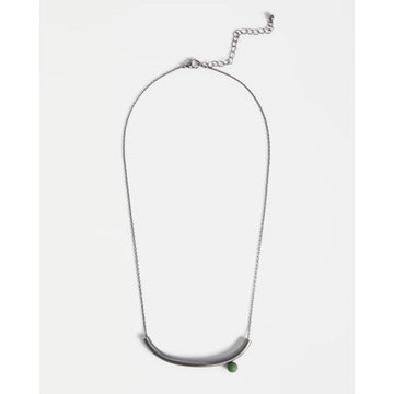 Necklace with a green bead on a white background.