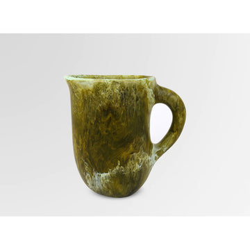 A resin jug in a dark olive green colour with white swirls.