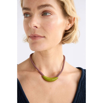 Necklace with pink mesh chain and green pendant on a white background
