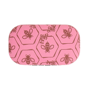 A small hard shell container illustrated with bees.