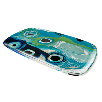 Top down view of a rectangular platter printed with artwork by May Wokka.