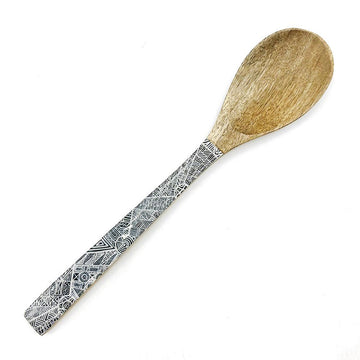 A wooden serving spoon with a printed black and white handle.