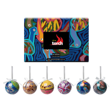 A set of six baubles each illustrated with a different animal design by different artists. The box lid is pictured too.