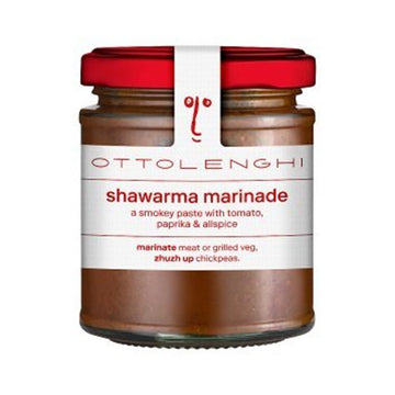 A jar filled with tomato paste and a white label on the front with the text 'Shawarma Marinade a smokey paste with tomato, paprika and allspice'.