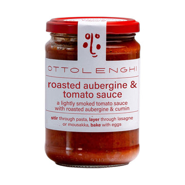 A jar filled with tomato sauce and a white label on the front with the text 'Roasted aubergine and tomato sauce'.