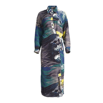 A dress with long sleeves and a collar printed with an abstract print of a lighthouse and waves.