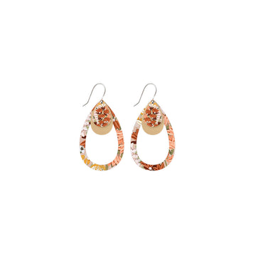 A pair of tear drop shaped drop earrings printed with orange floral artwork.