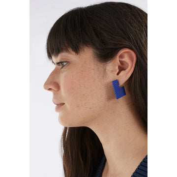 A pair of square hoop shaped earrings in white with diagonal lines.