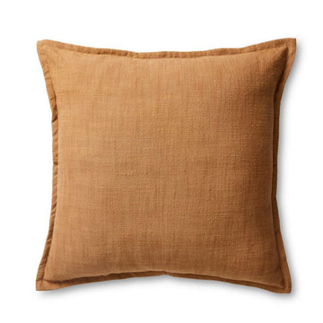 A square cushion in a rust brown colour.