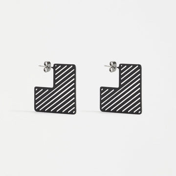 A pair of square hoop shaped earrings in black with diagonal lines.