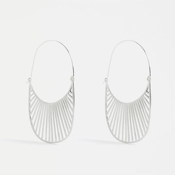 An image of a silver pair of hooped earrings with a fan detail at the bottom.