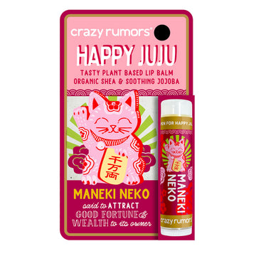 A tube of lip balm attached to a card with the text 'Happy Juju' at the top and an illustration of the lucky cat.