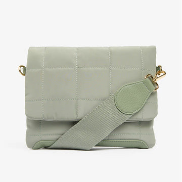 Front view of a satchel style bag in sage in a quilted design.