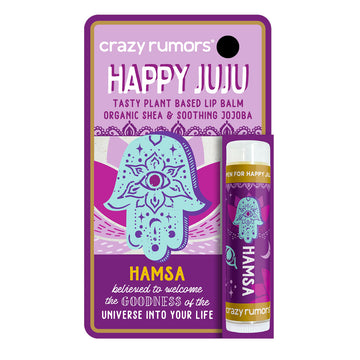 A tube of lip balm attached to a card with the heading 'Happy Juju' with an illustration of Hamsa.