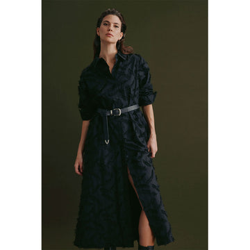 An image of a black dress with feather embroidery.