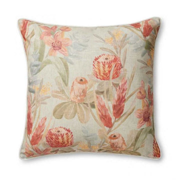 A square cushion illustrated with orange flowers and green leaves on a light green background.