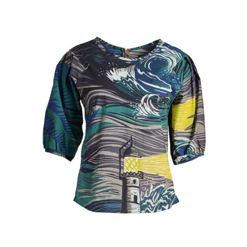 A women's blouse printed with an abstract wave and lighthouse print.