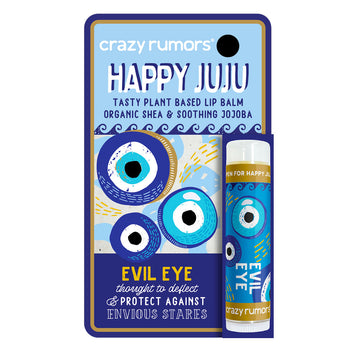 A tube of lip balm attached to a card with the heading 'Happy Juju' with illustrations of evil eyes.