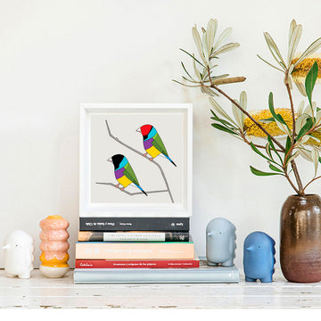 Illustration of colorful birds on a branch against a light gray background.