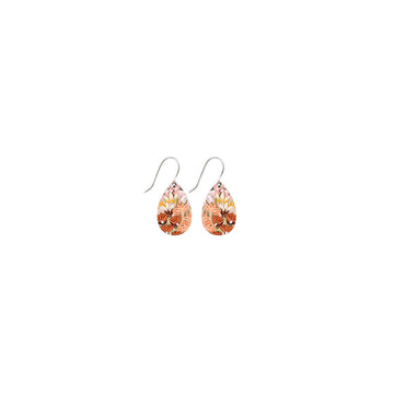 A pair of tear drop shaped earrings printed with floral artwork.