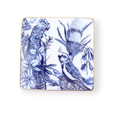 A square trinket tray illustrated with birds and flowers in blue.
