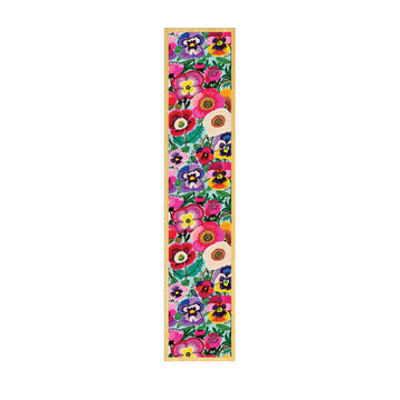 A wooden bookmark printed with different coloured pansies.
