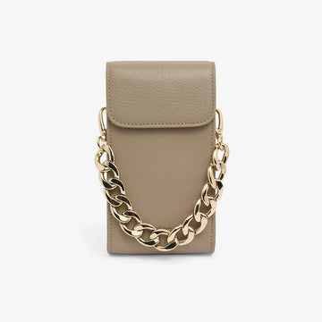 Front view of a bag in putty coloured pebble leather designed for phones in leather with a chunky gold strap.