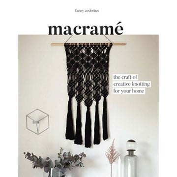 'Macrame' book cover featuring a photo of a black macrame creation hanging against a wall.