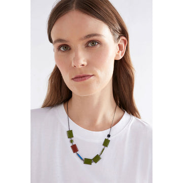 A necklace with assorted sizes of rectangle beads in blue, green and red.