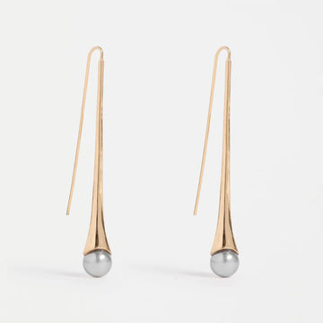 Pair of gold earrings with silver beads on a white background.