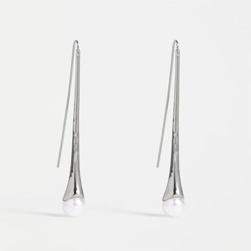 Pair of silver drop earrings on a white background.