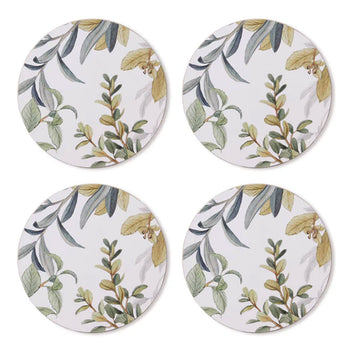 A set of four round coasters in white illustrated with leaves.
