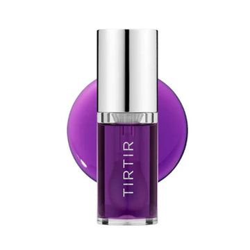 Purple lip gloss with silver cap on a white background.
