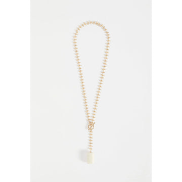 A necklace with beaded chain detail and a white block pendant.