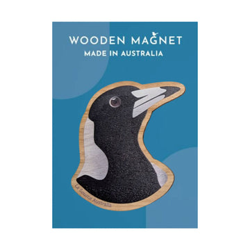 Wooden magnet shaped like a magpie on a blue background with text 'Wooden Magnet Made in Australia'.