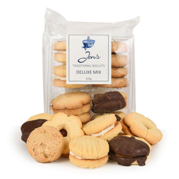 A clear packet filled with assorted biscuits and a few biscuits in front of the packet.