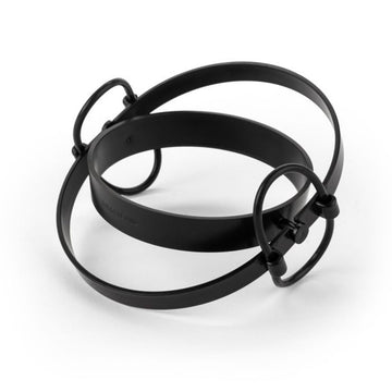 A box with the heading 'Suitcase Cup Holder' with a photo of a coffee cup attached to a black ring attached to the handle of a suitcase.