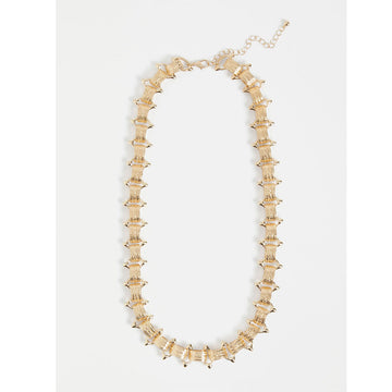 A gold chunky chain necklace with spiky links in between.