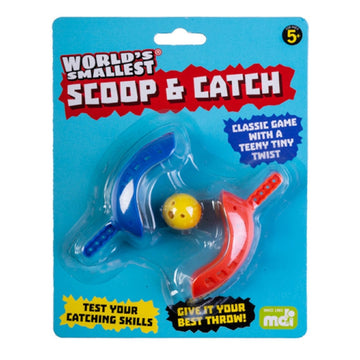 Two scoops and a ball inside clear packaging attached to a blue information card.