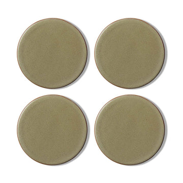 A set of four round coasters in an olive green colour.