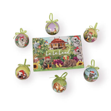 Set of Christmas ornaments with a 'La La Land' box in the center on a white background. The baubles and box are illustrated with Australian animals.