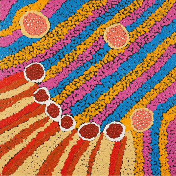 A square painting with a pink, blue and yellow striped background meeting red and yellow stripes on the bottom left corner and pink and red circles.