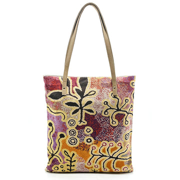 A tote bag printed with artwork by Paddy Stewart with light brown straps.