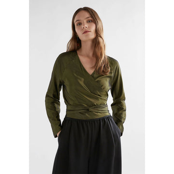 A women's long sleeve top in khaki green metallic fabric with a wrap around design.