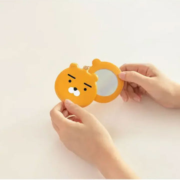 A PVC keyring shaped like a bear.