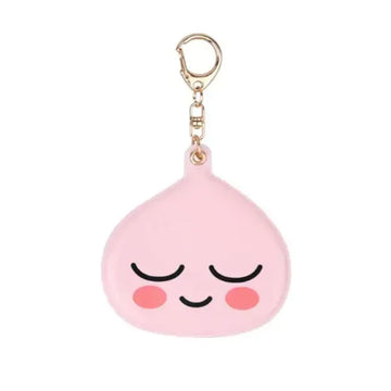 Pink emoji-shaped keychain with a gold clasp on a white background.