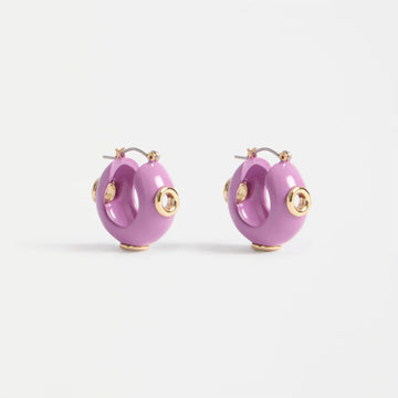 Pair of pink hoop earrings with gold accents on a white background