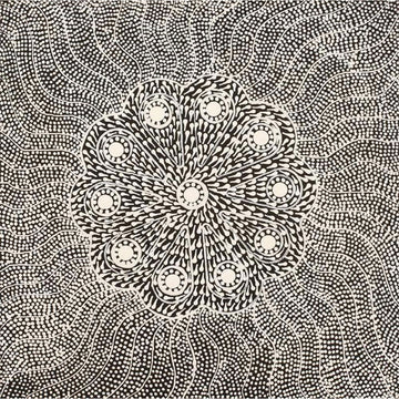 A square painting in black and white with a flower shape in the middle.